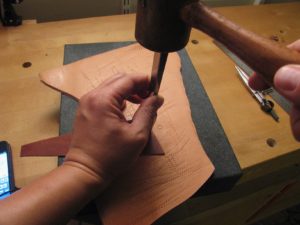 pricking irons hit with mallet