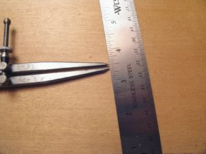 pricking irons compass